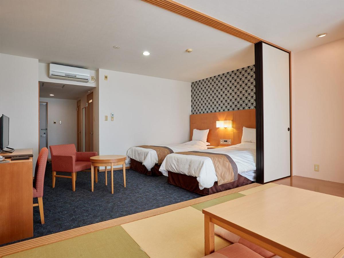 Hotel Murasakimura Yomitan Exterior foto